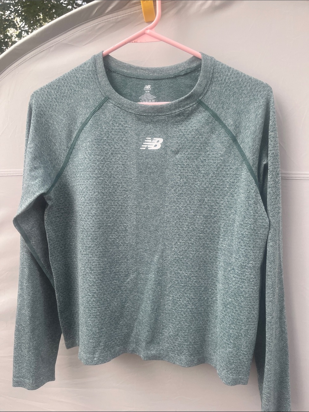 New Balance Women's Heather Sage Green Long Sleeve Crew cropped Top